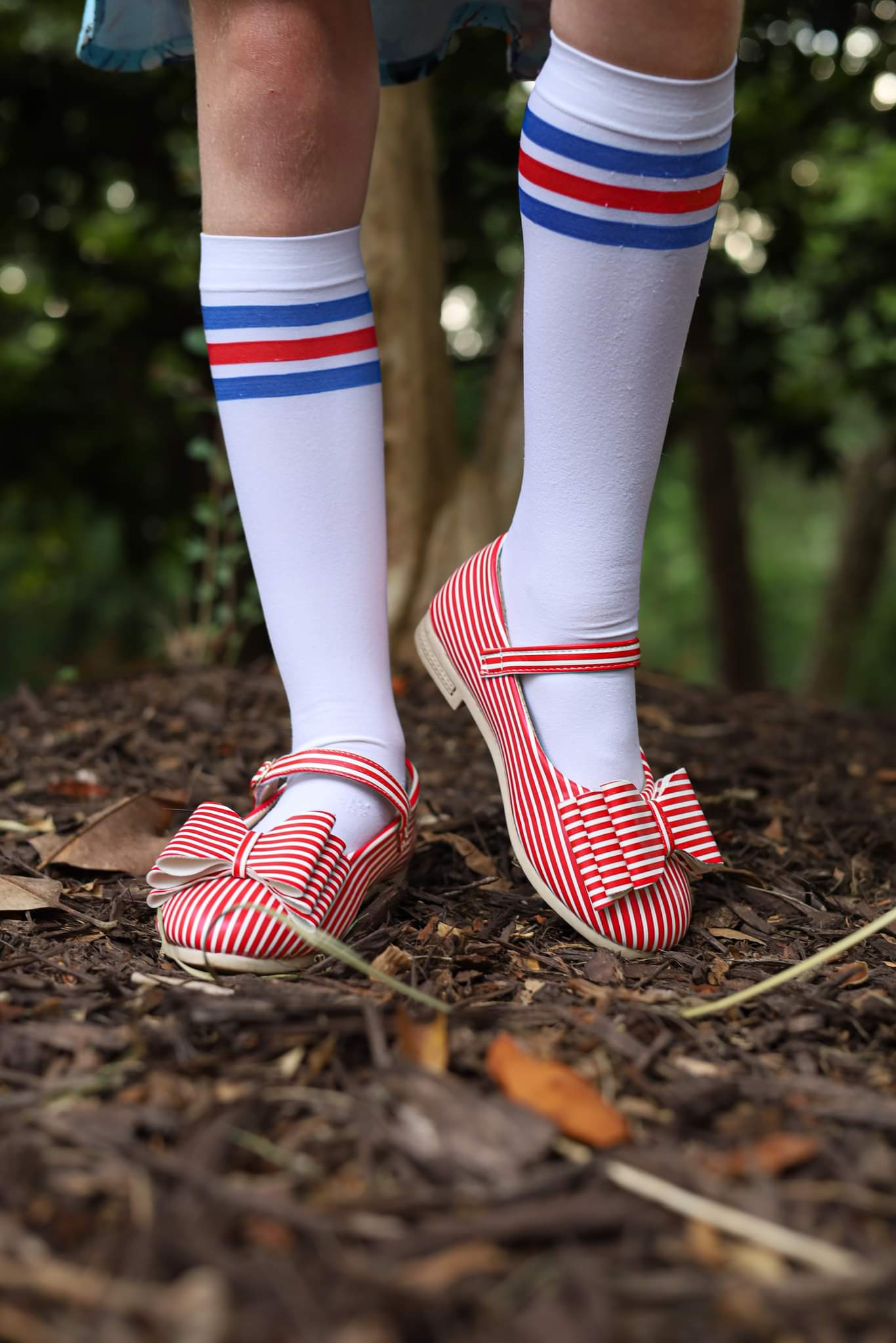 Red shoes with white stripes hotsell